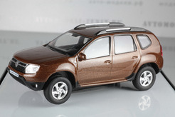 Renault Duster, 2010г. (коричневый металлик)